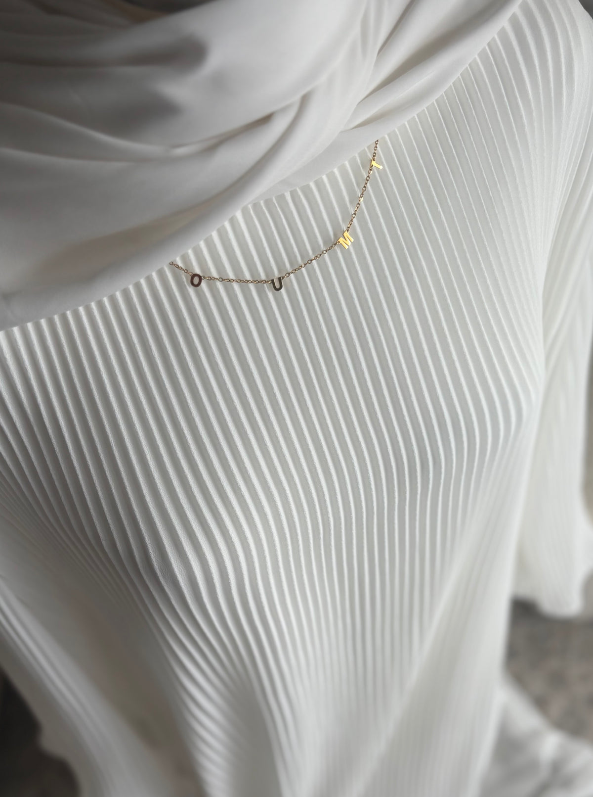 COLLIER OUMI